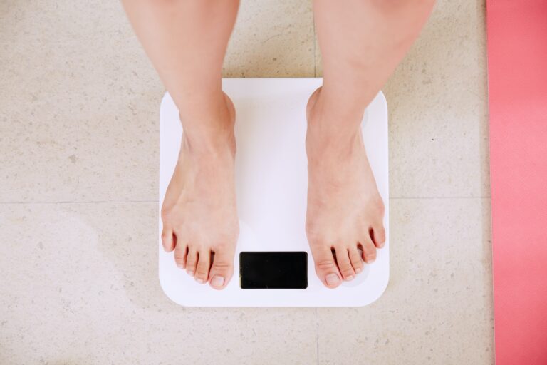 standing on a weighing scale